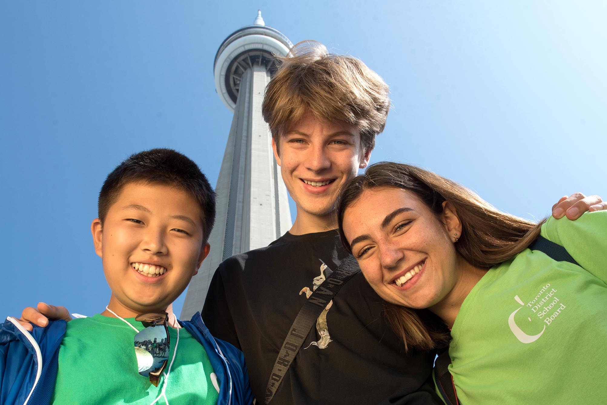 Students smiling with CN Tower in the back Open Gallery
